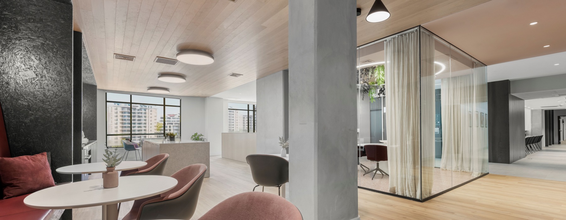 Coworking tables and a conference room