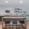 Kitchen with island seating and custom shelving