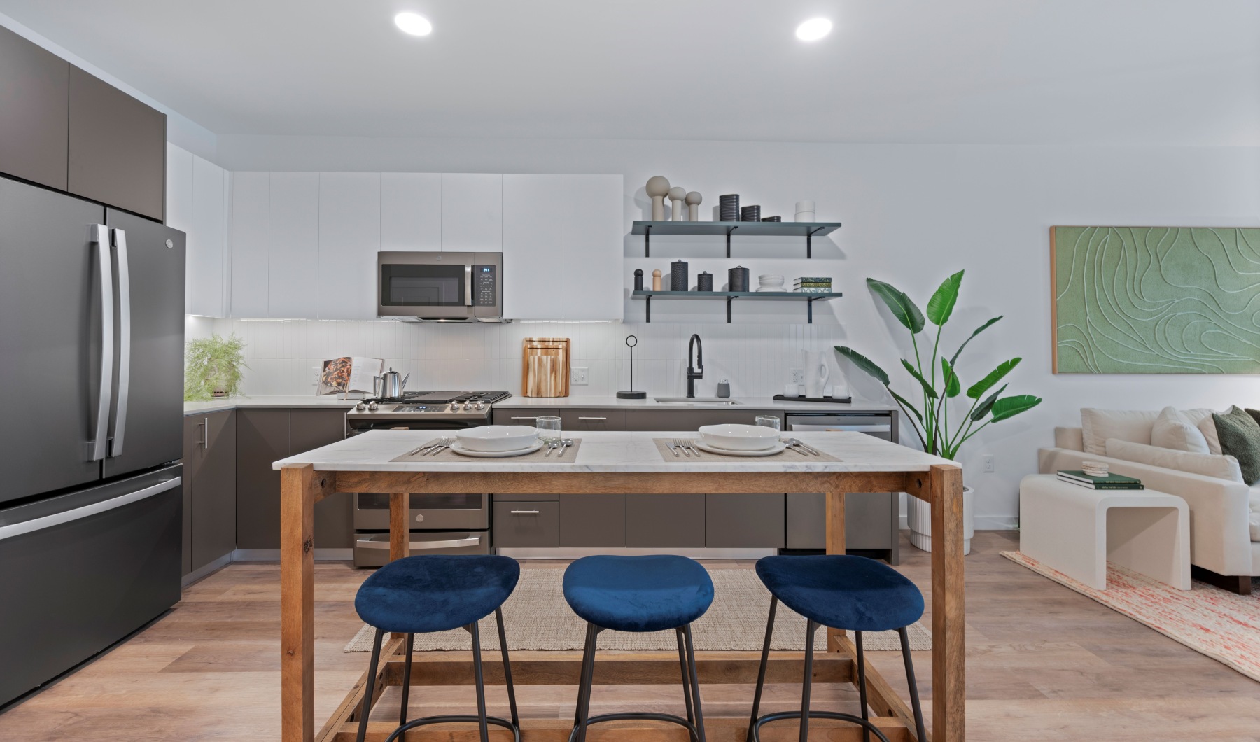Beautiful kitchens with designer finishes Kitchen with island seating and custom shelving