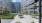 Outdoor courtyard with putting green and seatin