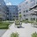 Outdoor courtyard with putting green and seatin