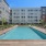 A pool in front of a building