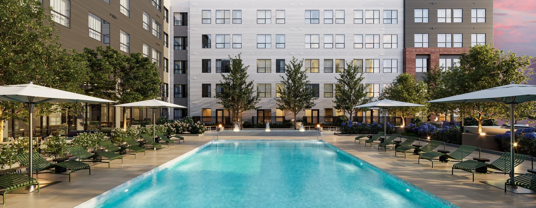 a swimming pool in front of a building